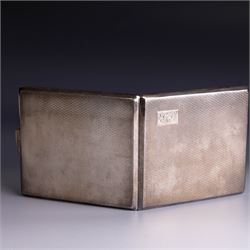 Mid 20th century silver cigarette case, with engine turned decoration and engraved initials to cover, with presentation engraving to the interior, hallmarked Harman Brothers, Birmingham 1947, H8.5cm, W9.5cm