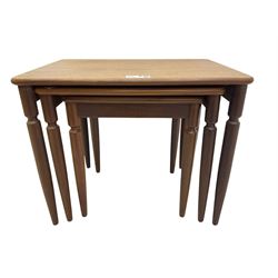 G-Plan - teak nest of three tables, rectangular top raised on turned supports