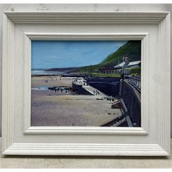 John Caw*** (British Contemporary): 'Clock Cafe South Bay Scarborough', oil on canvas signed with initials, indistinctly signed verso 18cm x 23cm