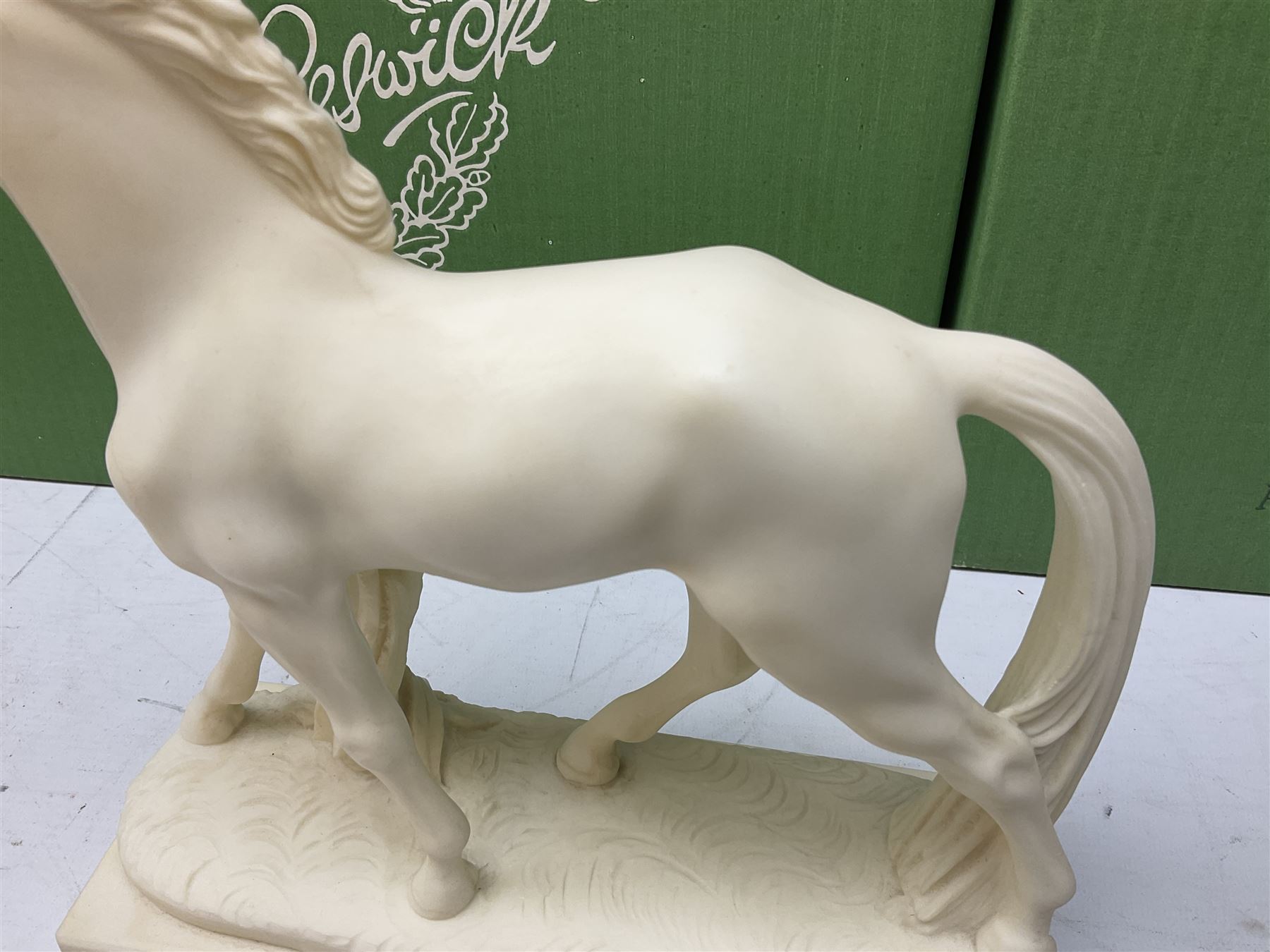 Five Beswick and Royal Doulton horse figures in matt white on black plinths, comprising of  Spirit of Affection no. 2689/2536, Springtime no.2837, Spirit of peace no.2916, Spirit of earth no.2914 and Spirit of the wild no. 183, together with a composite figure of a horse (6)