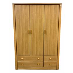 Light oak finish triple wardrobe with four drawers