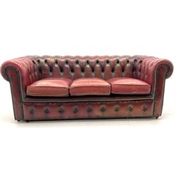 Chesterfield three seat sofa, upholster in deep buttoned ox blood leather