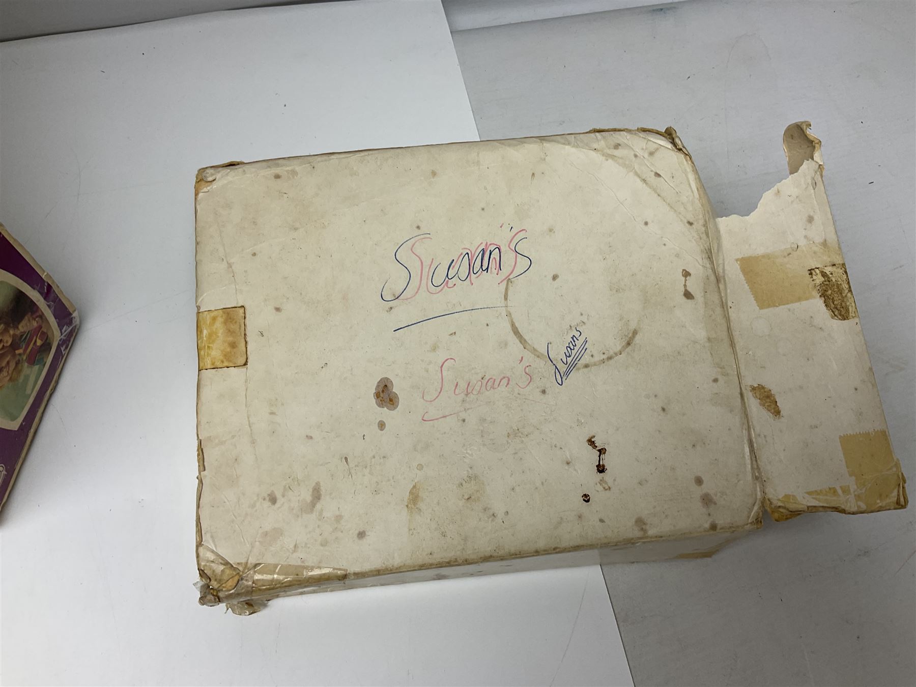 Two boxed Bradgate Penny Puppywalker dolls; Garfield soft toy and Panini sticker album; boxed Stylophone with instructional 45rpm record; and other toys