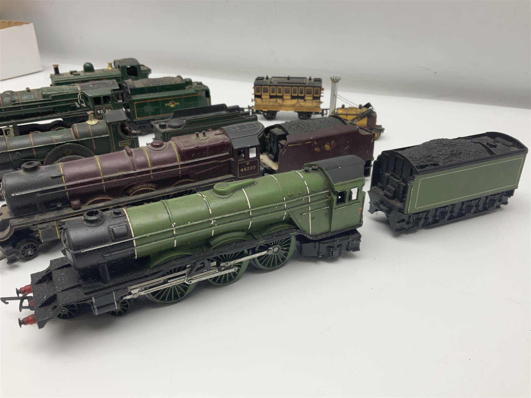 Hornby/Tri-ang '00' gauge - six locomotives - Class 9F 2-10-0 'Evening Star' No.92220; Class A3 4-6-2 (no name or number); Dean Single 4-2-2 'Lord of the Isles' No.3046; Princess Class 4-6-2 'The Princess Royal' No.46200; Class 57XX Pannier 0-6-0 tank No.8751; and Stephenson's Rocket with one passenger coach; all unboxed (6)