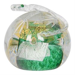 Michael James Hunter Twists Scottish glass paperweight topped with white and green lizard, signed to base, together with Karlin Rushbrooke studio glass,  Wedge Bottle in green and white, bottle H19cm