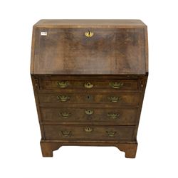 Georgian walnut bureau, banded and feather strung, fall front enclosing fitted interior, four graduating drawers, on bracket feet