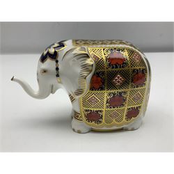 Two Royal Crown Derby paperweights, Imari Elephant, trunk raised with gold stopper and Mandarin Duck with silver stopper, both with printed mark beneath, elephant H10cm
