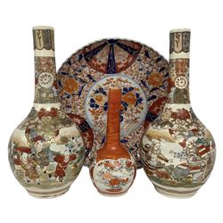 Collection of Japanese ceramics comprising pair of Satsuma vases decorated with panels depicting children and samurai figures, together with a Kutani vase painted with birds and flowers, all with painted character marks beneath, and an Imari plate, largest vase H31cm