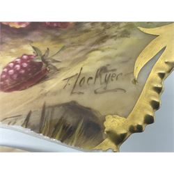 Early 20th century Royal Worcester dish decorated by Thomas Lockyer, oval form with gilt shaped rim and twin shell handles, hand painted with a still life of fruit upon a mossy ground, signed T Lockyer, with puce printed mark beneath and date code for 1922, for restoration, W31cm