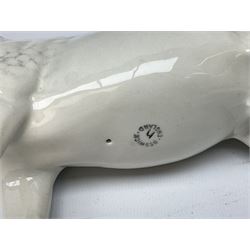 Collection of Beswick horses, including grey horse no.701, palomino foal no 836, grey stocky jogging mare no.855 etc, together two Royal Doulton horses, (8)