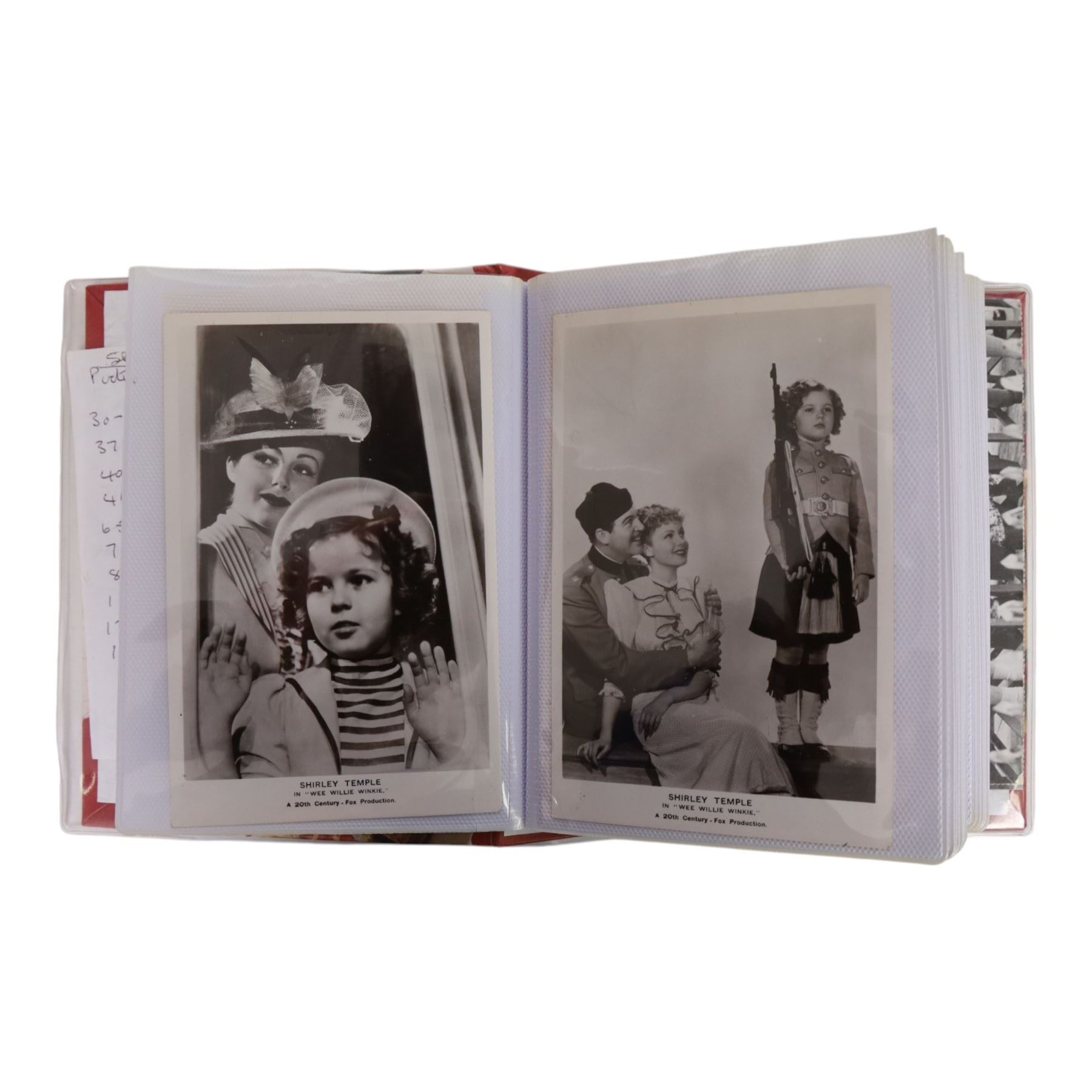 Collection of photographs and postcards, mostly depicting 1940s film stars, including some autographed examples and some with printed signatures, together with a collection of Shirley Temple  promotional photographs,1930s autograph album and postcards of the Royal Family