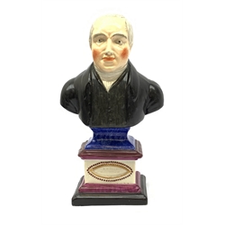 An unusual Staffordshire bust, probably Barker, Sutton and Till, modelled as William Clowes, upon pedestal base with inscription, the bust with painted initials verso T.H, H26.5cm. 