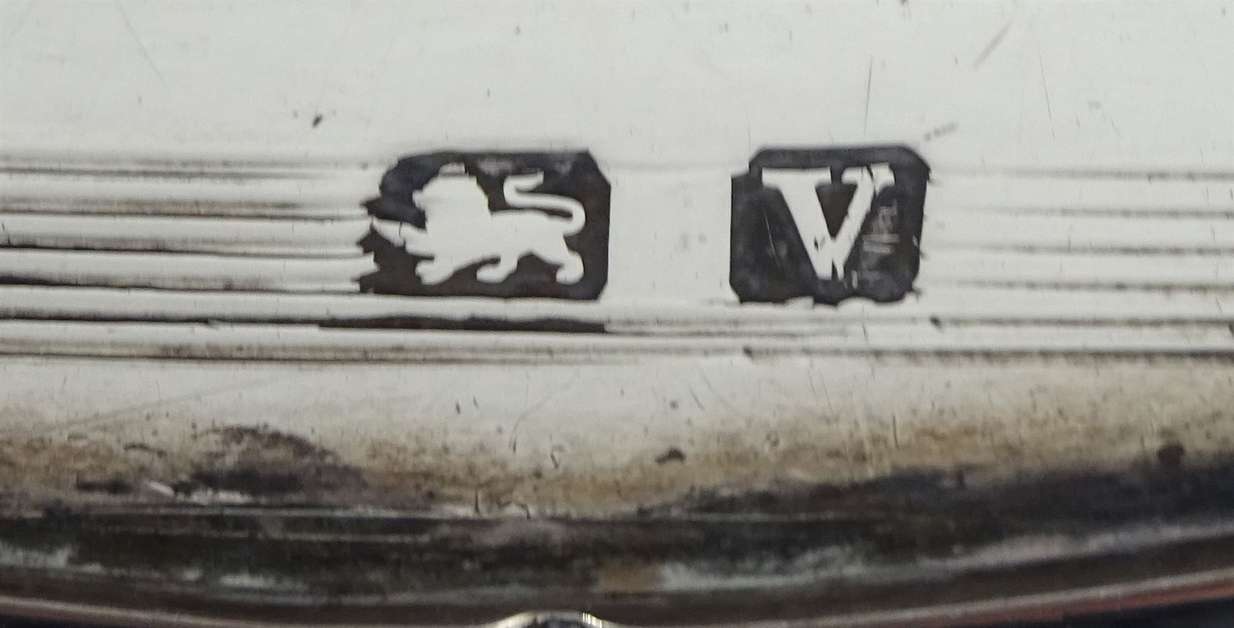 Pair of silver candlesticks by P H Vogel & Co, Birmingham 1970, silver spectacle case by W J Myatt & Co, Birmingham 1920 and five silver butter knives by James Dixon & Sons Ltd, Sheffield 1919