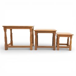 Squirrelman - nest of three tables, each with rectangular top upon octagonal turned supports with squirrel carving, by Wilfrid Hutchinson, Husthwaite