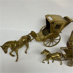 Three brass figures, one depicting a cowboy and his horse, two of horses and carts, largest H30cm