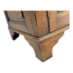 19th century and later oak dresser, moulding cornice a pierced and shaped frieze, over two open plate shelves above a base fitted with two drawers with brass swan neck handles, over panelled twin cupboard with single shelf, cantered corners on bracket feet