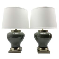 Pair of Chinese porcelain lamps, each of squat baluster form, decorated with a smokey crackle glaze, raised upon square brushed bronze base, H58cm including shade