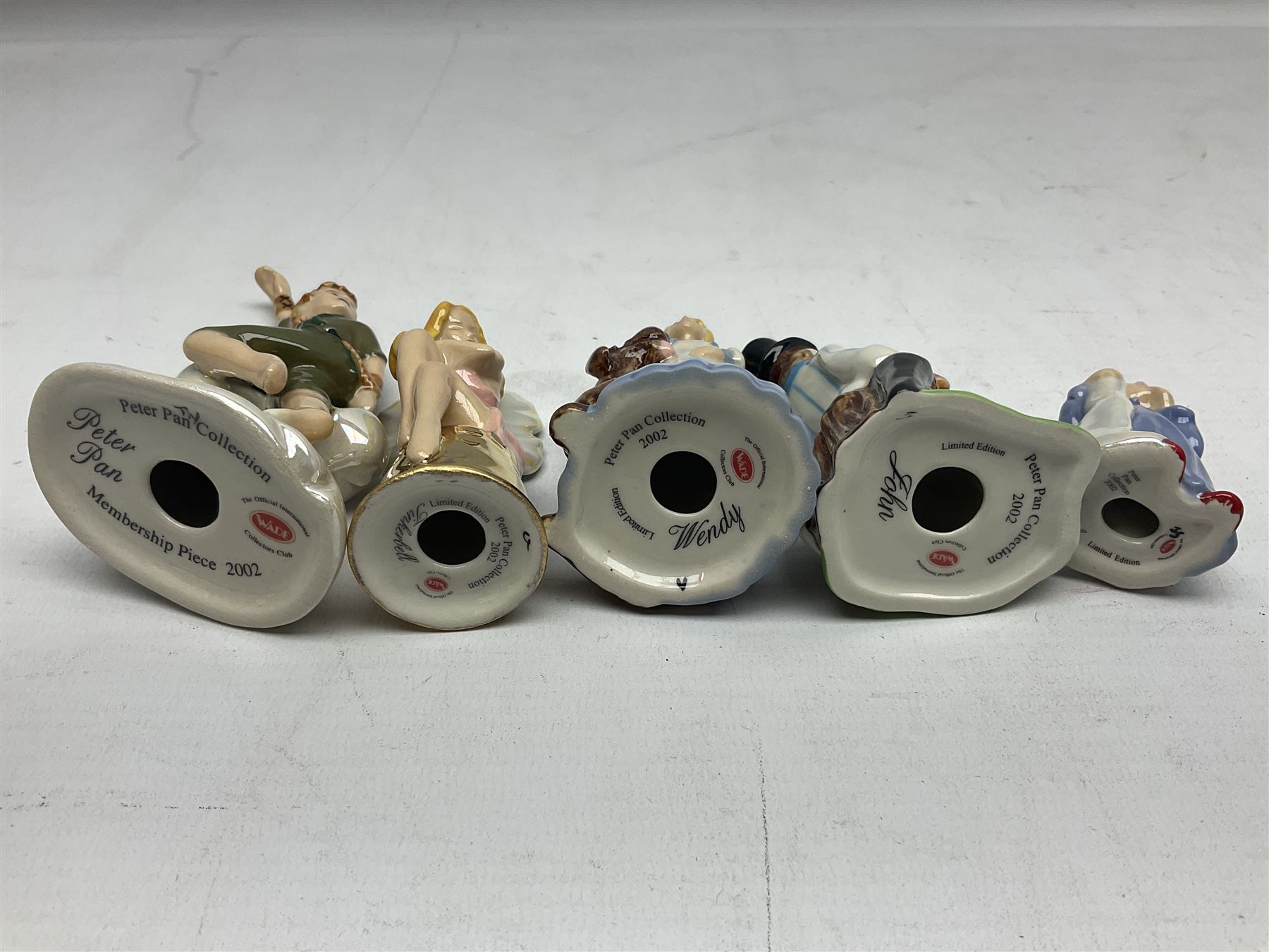 Twelve Wade Collectors Club Figures, comprising six Wind in the Willows figures; Rattie, Mole, Toad, Badger, Weasel and Rattie and Mole on the Water, Six Peter Pan figures; Captain Hook, Peter Pan, Wendy, John, Michael and Tinkerbell  