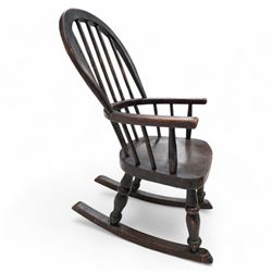19th century child's Windsor rocking chair, double hoop and stick back, dish seat on turned supports united by rockers 