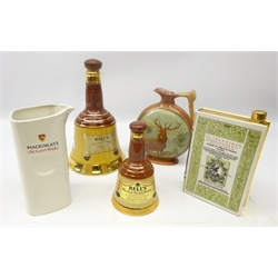  Royal Doulton Dewar's Whisky moon shaped flask, with antler style handle, the reserve decorated with a Stag at Bay , H20cm, Quixote whisky decanter in the form of a book, two Bell's Whisky decanters & Mackinlay's Old Scotch Whisky jug (5)  
