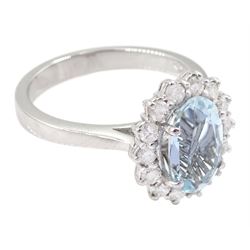 18ct white gold oval cut aquamarine and round brilliant cut diamond cluster ring, hallmarked, aquamarine approx 1.65, total diamond weight approx 0.45 carat