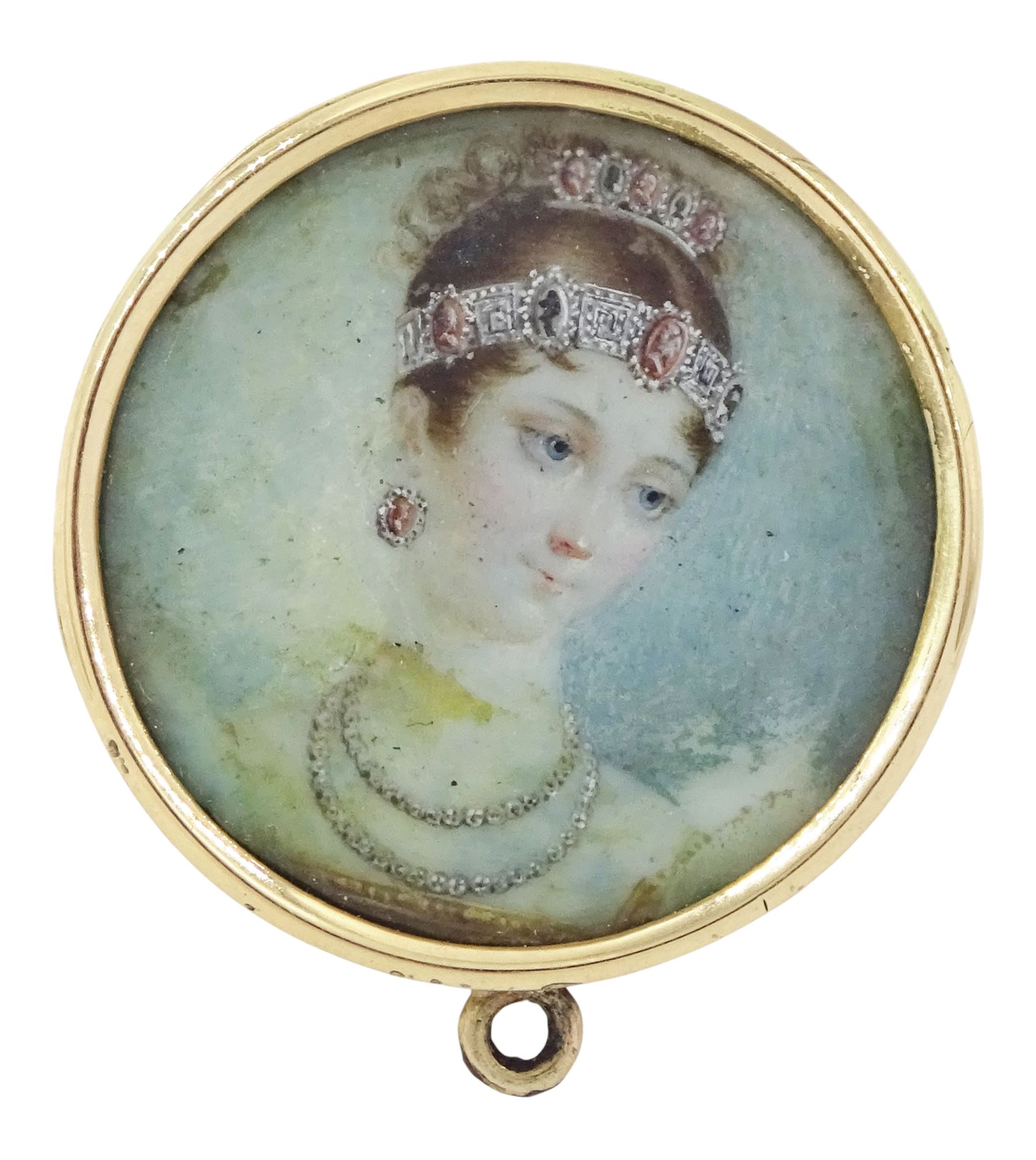 Victorian gold portrait brooch/pendant, set with a circular miniature of Pauline Bonaparte on ivory, under a glazed panel, within a gold mount, the reverse inscribed 'Pauline Bonaparte, B.Q.J, April 22nd 1891'. This lot has been registered for sale under Section 10 of the APHA Ivory Act