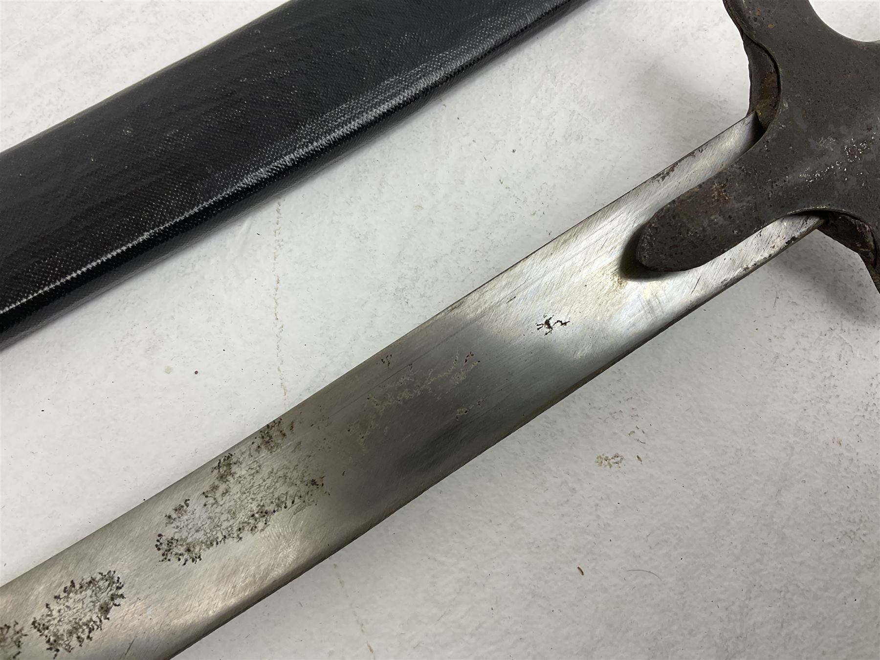 20th century Indian Tulwar sword with 71cm plain curving steel blade and iron hilt with extended langets, knopped grip and spiked pommel; in canvas covered wooden scabbard L87.5cm overall; together with five fencing swords comprising four foils and one epee, three marked Leon Paul, one in carrying case (6)