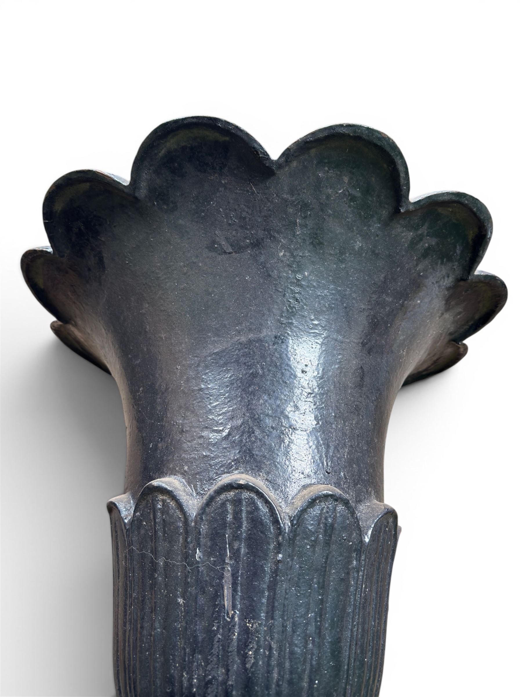 Pair of Victorian large scale cast iron garden urns, flared petal shaped rim with tapering waist, gadrooned base on square plinth, finished in black paint