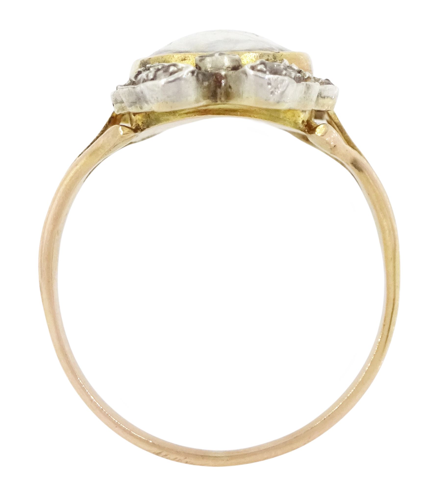 19th century gold and silver diamond portrait ring, set with an oval miniature of a woman on ivory, under a glazed panel, with rose cut diamond bow and floral sprigs below, to trifuricated shoulders. This lot has been registered for sale under Section 10 of the APHA Ivory Act