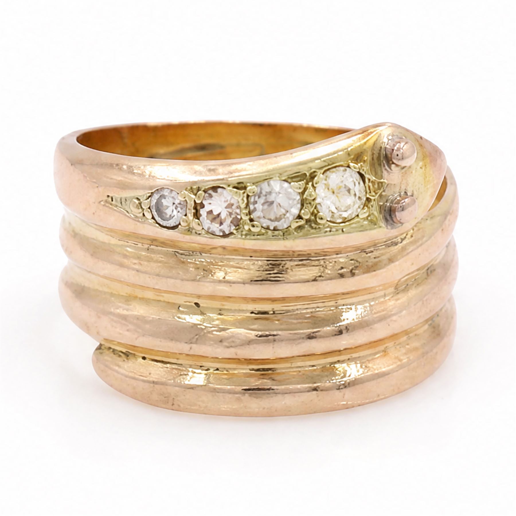 19th / early 20th century 9ct gold diamond coiled snake ring, the head set with four graduating old cut diamonds