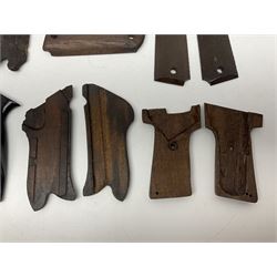 Six pairs of revolver grips;  pair of Lightwood & Son Ltd powder/shot measures in original box; and boxed Colt hammer shroud 