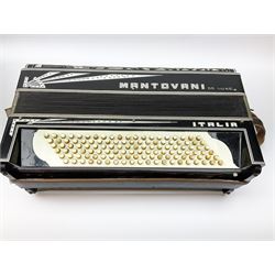 Italian Mantovani piano accordion with Art Deco style black and white case, twenty-four keys and one-hundred and twenty buttons L52cm in carrying case
