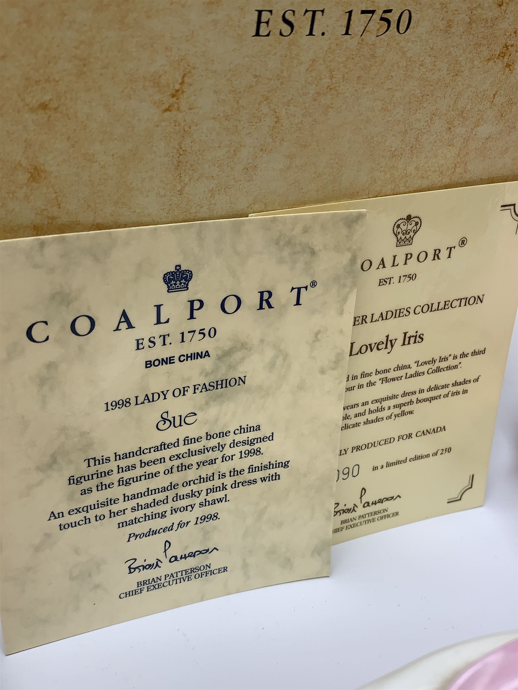 A group of four Coalport figurines, comprising limited edition The Flower Ladies Collection Lovely Iris, 90/250, with accompanying certificate, Ladies of Fashion Sue, with accompanying certificate, Ladies of Fashion Joan, and Ladies of Fashion Young Love, with one box.