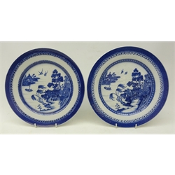  Pair late 19th century Chinese Export blue and white plates, decorated in the Willow pattern, D24.5cm   