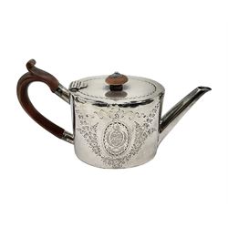 George III silver bachelors teapot, of oval form with wooden scroll handle and finial, the body chased with armorial crest and ribbon swag and foliate detail, hallmarked Samuel Godbehere & Edward Wigan, London 1793, including handle H9cm