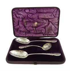 Pair George IV silver strawberry spoons, with later bright cut decoration, hallmarked Adam Elder, Edinburgh 1829, and a matched Victorian sifter, hallmarked Edinburgh 1864, contained within a fitted case, approximate total weight 5.33 ozt (166 grams)

