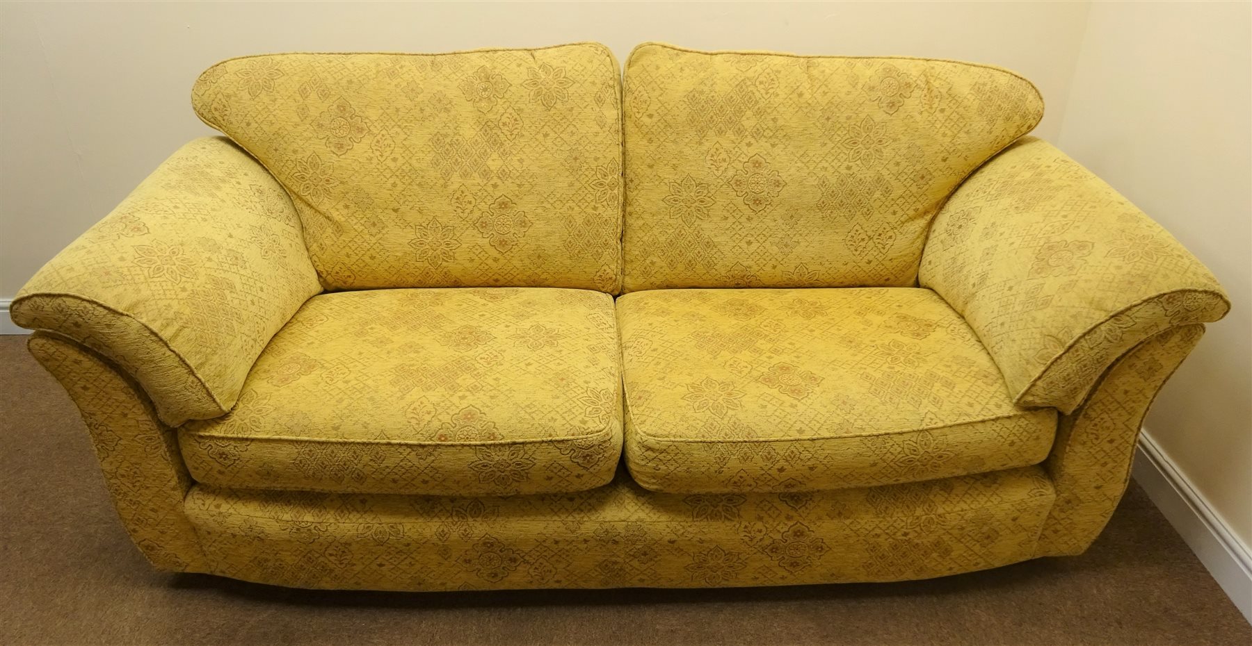 Marks and Spencer's three seat sofa upholstered in a floral patterned