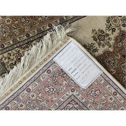 Finely knotted silk on silk ivory ground runner (L185cm,  W76cm), overall floral design together with a prayer rug (L94cm, W63cm)