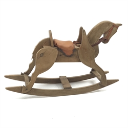  Early 20th century small pitch pine rocking horse, L111cm, H71cm  