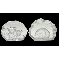 Two Mats Jonasson, Sweden paperweights, comprising polar bear in ice cave no 3152 and lion cubs, both with etched marks beneath, tallest H11.5cm