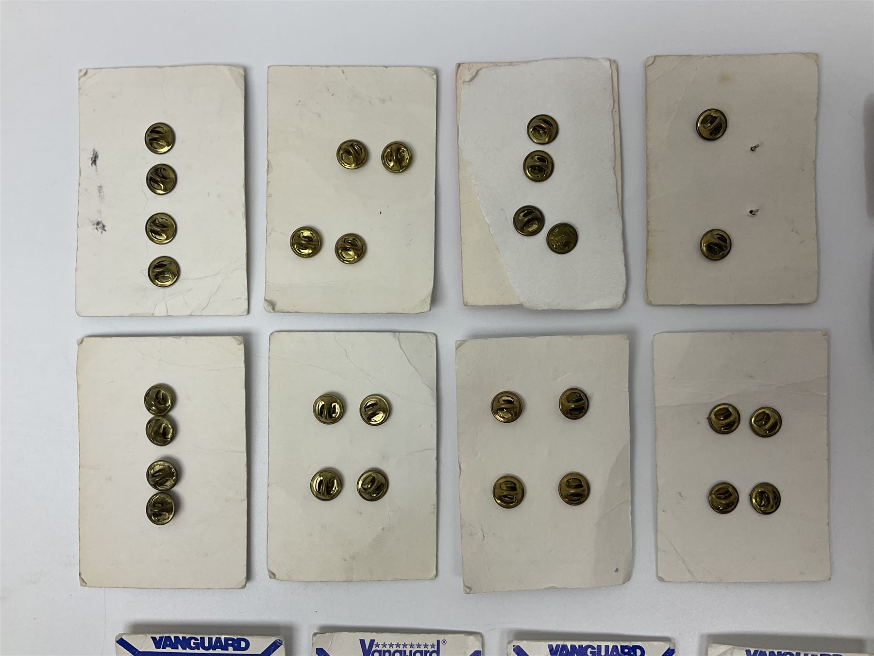 Fifty US rank badges and trade badges; WW2 and Vietnam period; predominantly on sale cards