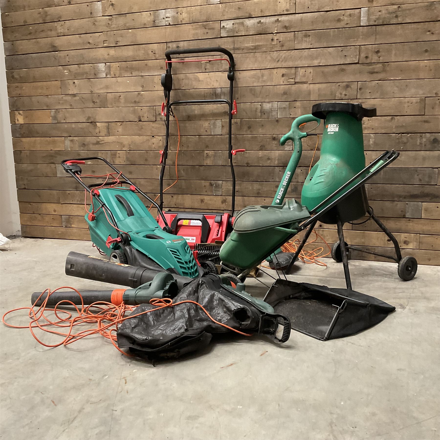 A Bosch Rotak 34R lawn mower, a Bergman Pro 3in1 Scarficer, Rake & Sweeper, a Black &Decker GS1800 chipper, a strimmer and a blower