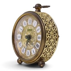 Large collection of miniature novelty clocks, including examples modelled as ships, a lamp, handbag, sewing machine, lamp etc 