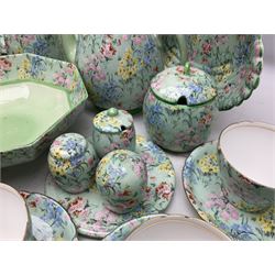 Shelley Melody pattern tea service for six, to include teapot, teapot stand, hot water jug, milk jug, covered sucrier, teacups and saucers, cake plates etc (31)
