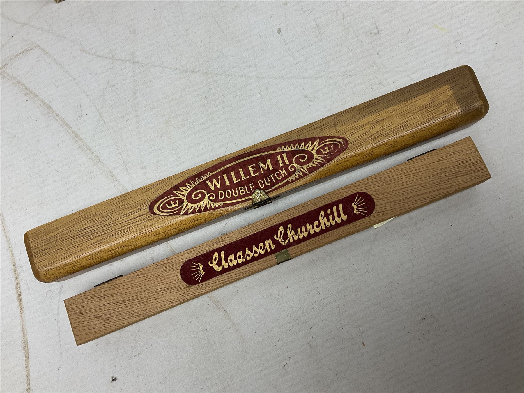 Victorian leather cigar protector with metal match striking plate on the end, and quantity of boxed cigars, comprising Willem II Churchill cigar, Willem II double dutch, Quintero Y Hno Habana cigars and Romeo Y Julieta, habana