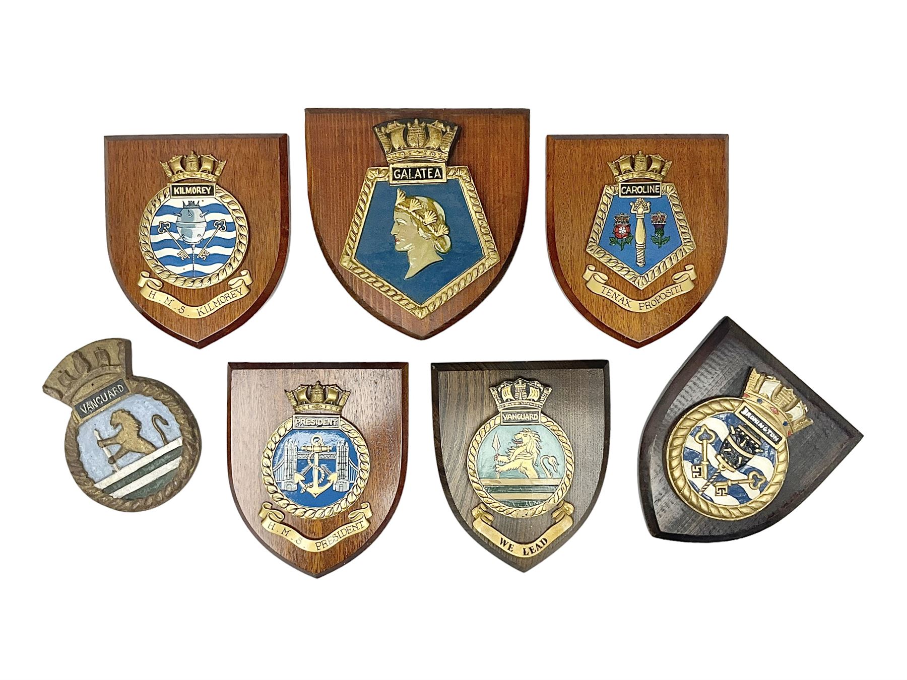 Six Naval wall shields, including HMS President, Vanguard, HMS Kilmorey etc, and another plaque 