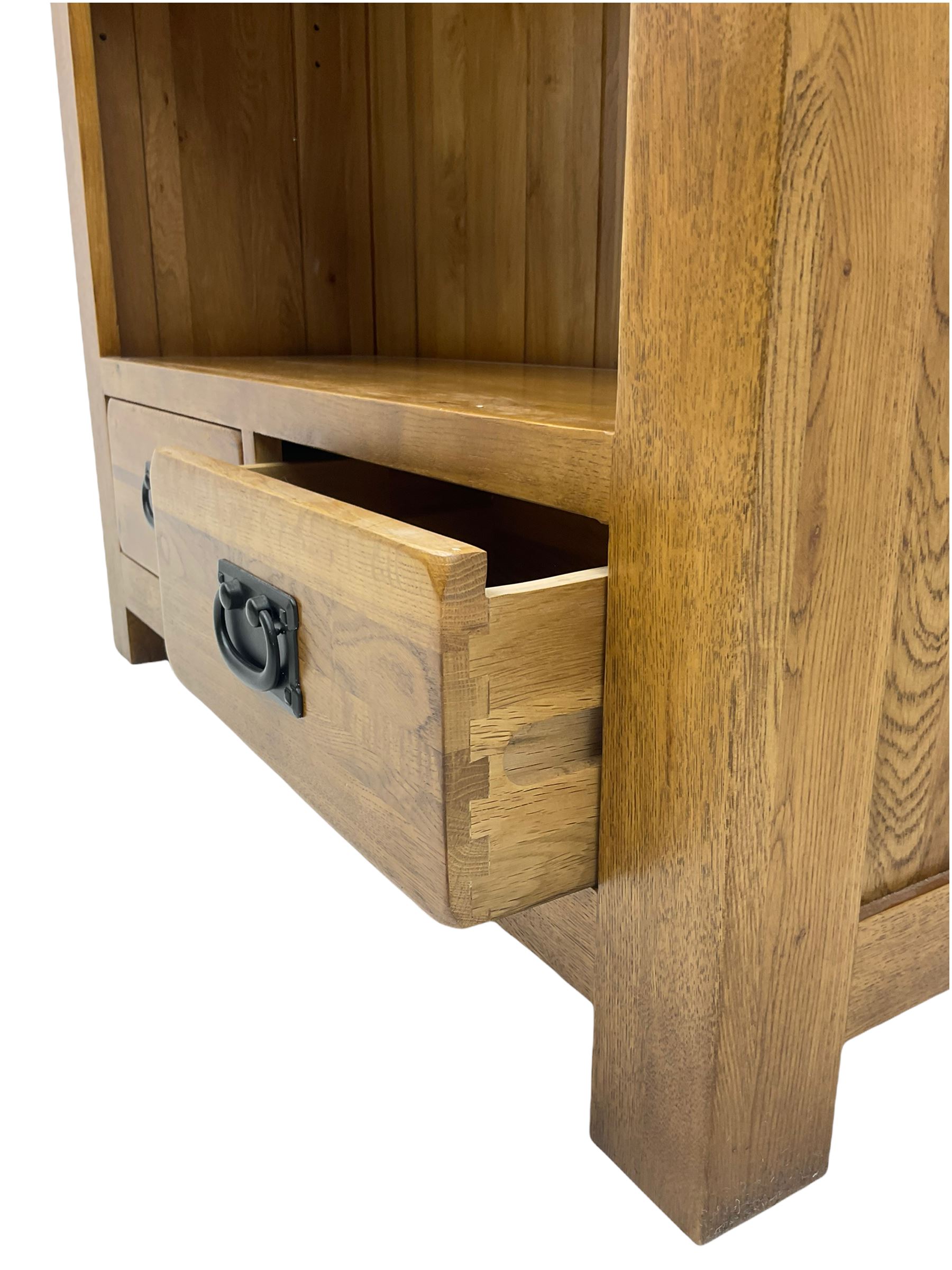 Light oak open bookcase, fitted with two drawers The Furnishings Sale