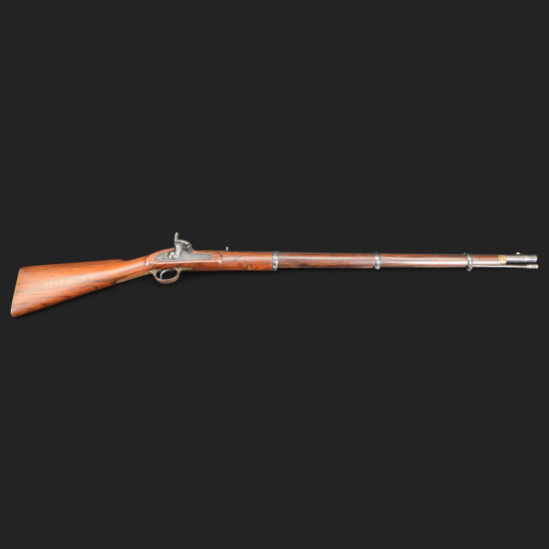 Enfield .577 action rifle, the 91.5cm rifled barrel with three barrel bands and ramrod under, full walnut stock, action marked 'Enfield' with Victoria cypher, overall L131cm