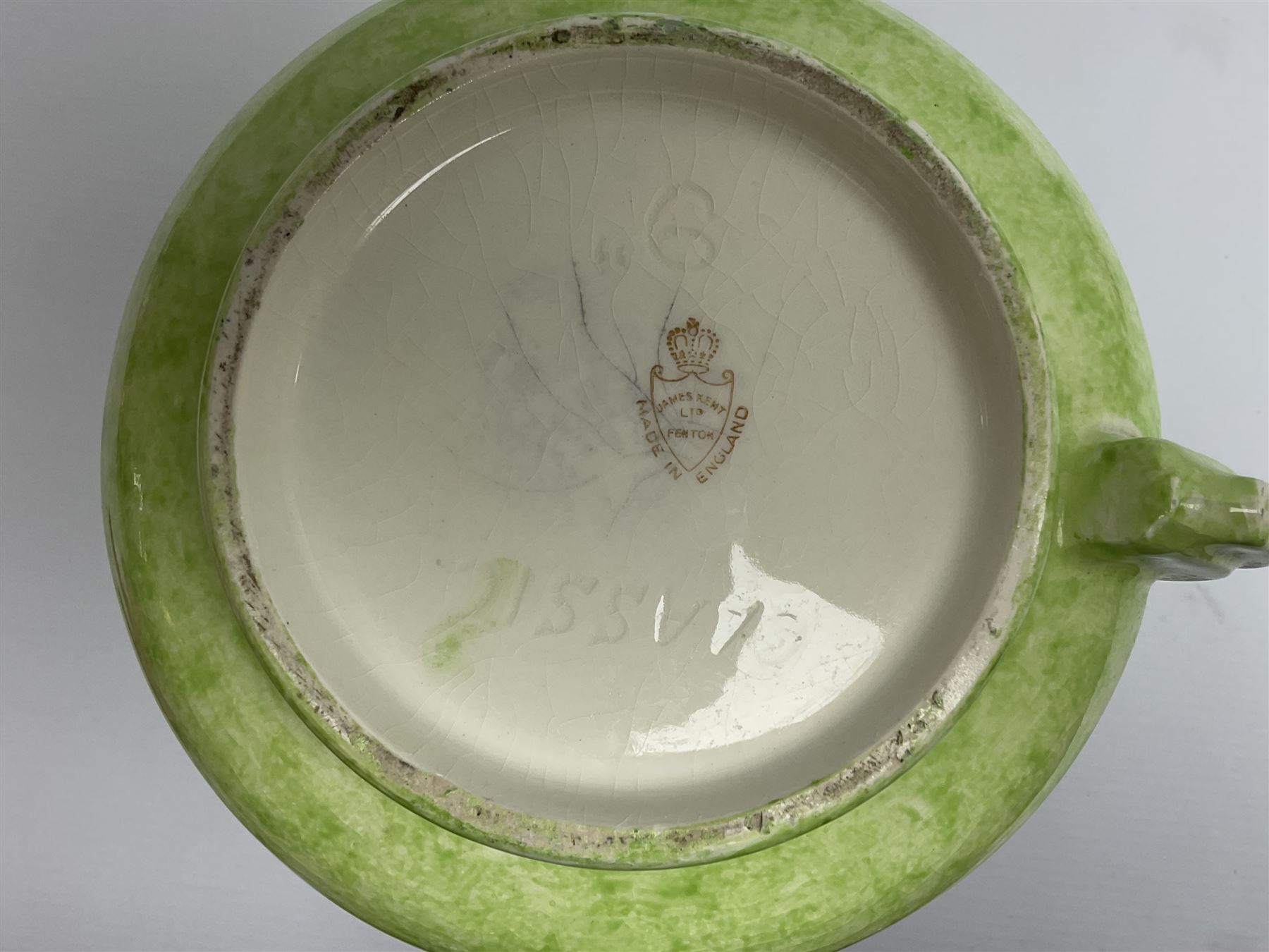 Victorian Wedgwood blue jasperware jardiniere H16.5cm; Victorian copper lustre jug; James Kent art deco style green glazed jug; and Beswick figure of a singing cat (4)