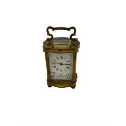 A French dauphine cased carriage clock c1890, four bevelled glass panels and a rectangular glass to the top, with a white enamel dial with Roman numerals, minute markers and steel spade hands, with painted decoration beneath, eight-day movement with a replacement lever platform escapement.



